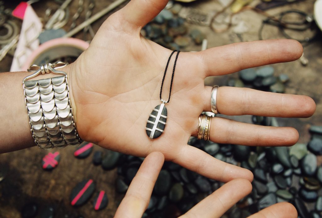 beach stone wrapped in silver pieces