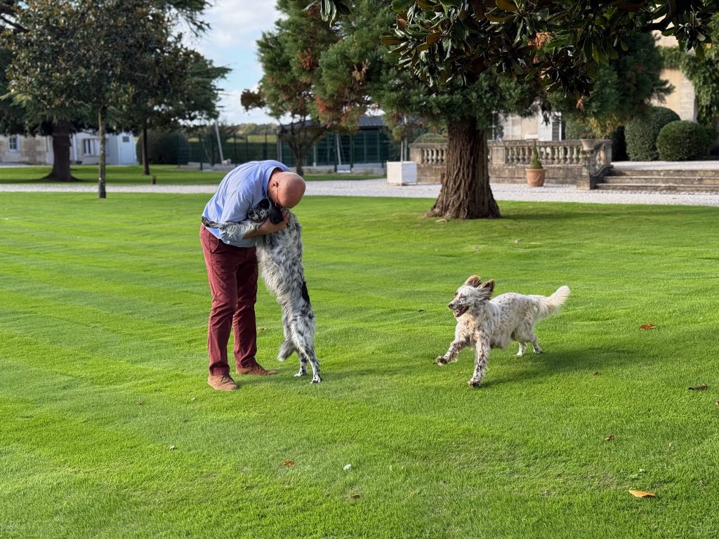 Bruno Borie with two of his dogs on the property