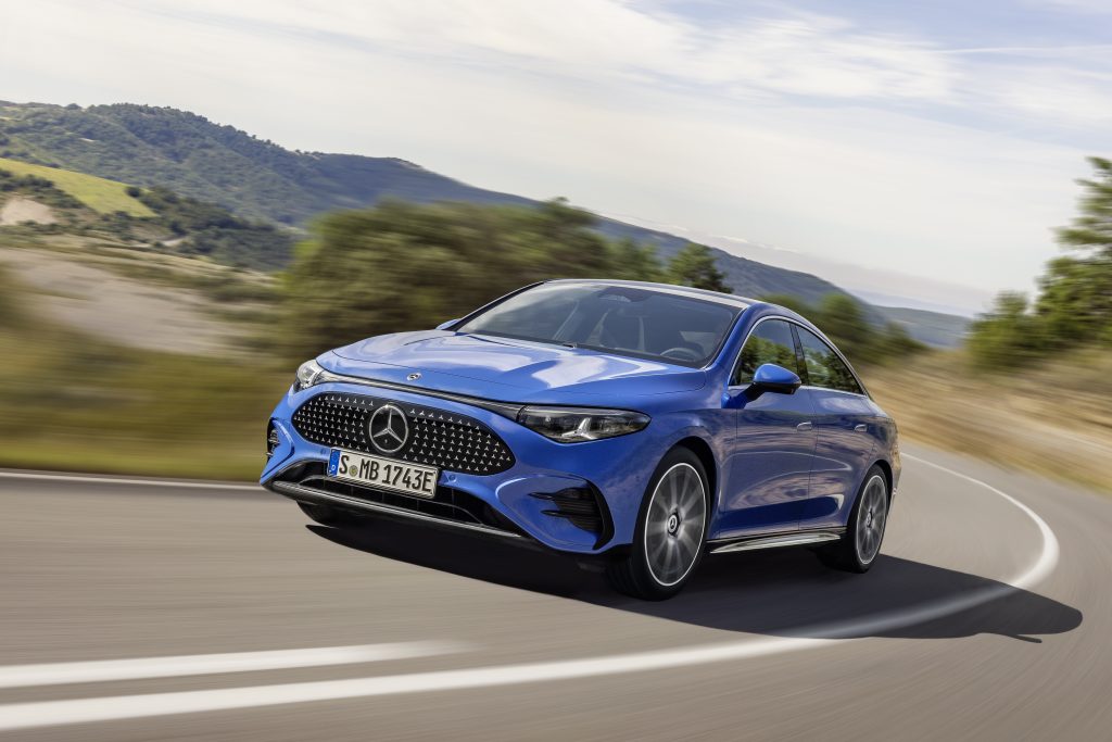 The all-new Mercedes-Benz CLA in blue shown on a road